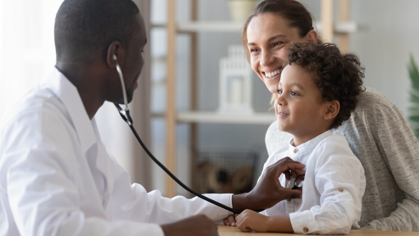 Doctor with mother and child