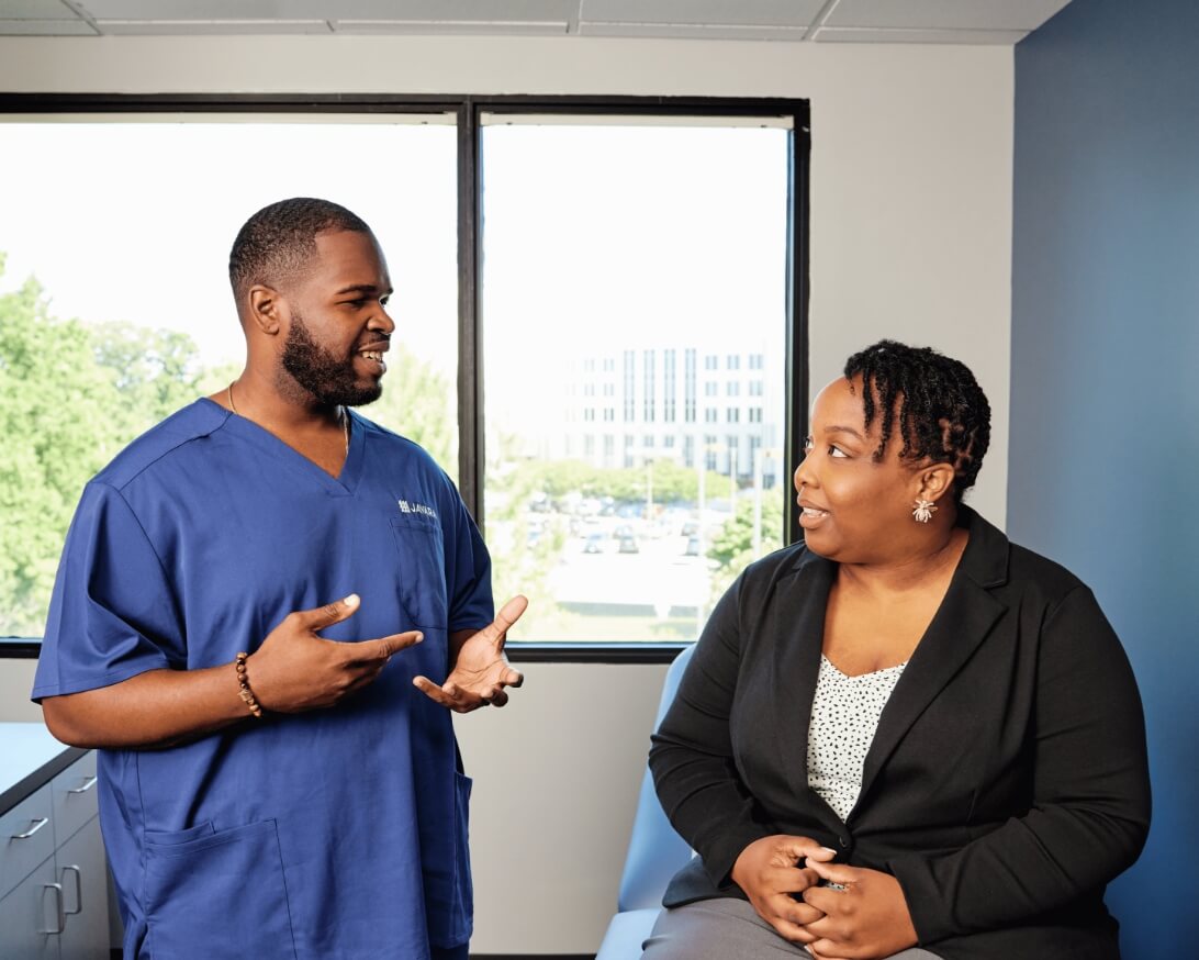 Javara employee talking to a patient