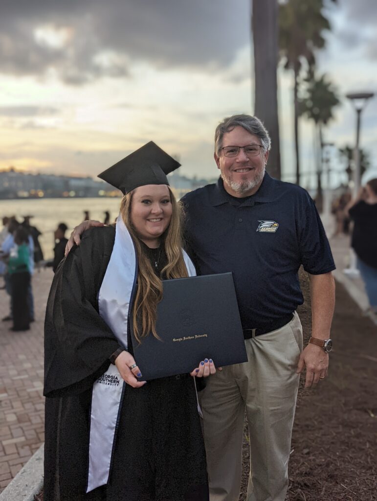 Picture of Hannah with her diploma 