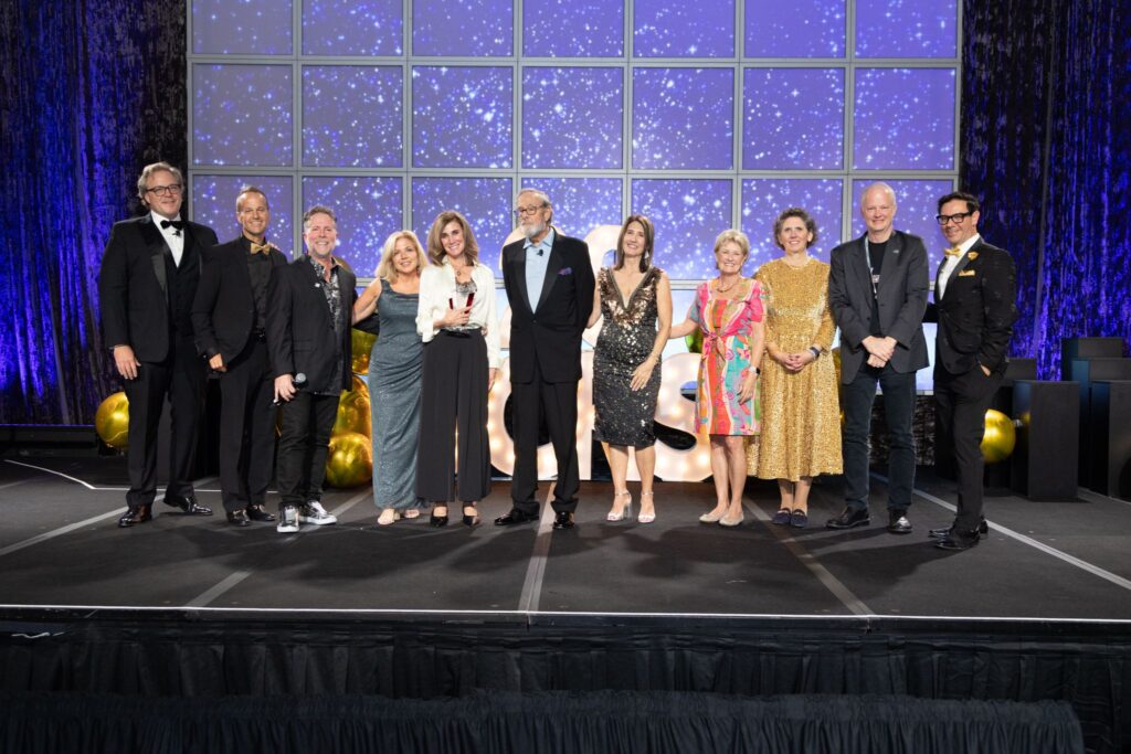 Jennifer Byrne onstage at SCRS Gala being presented with the 2026 Christine K. Pierre Award.